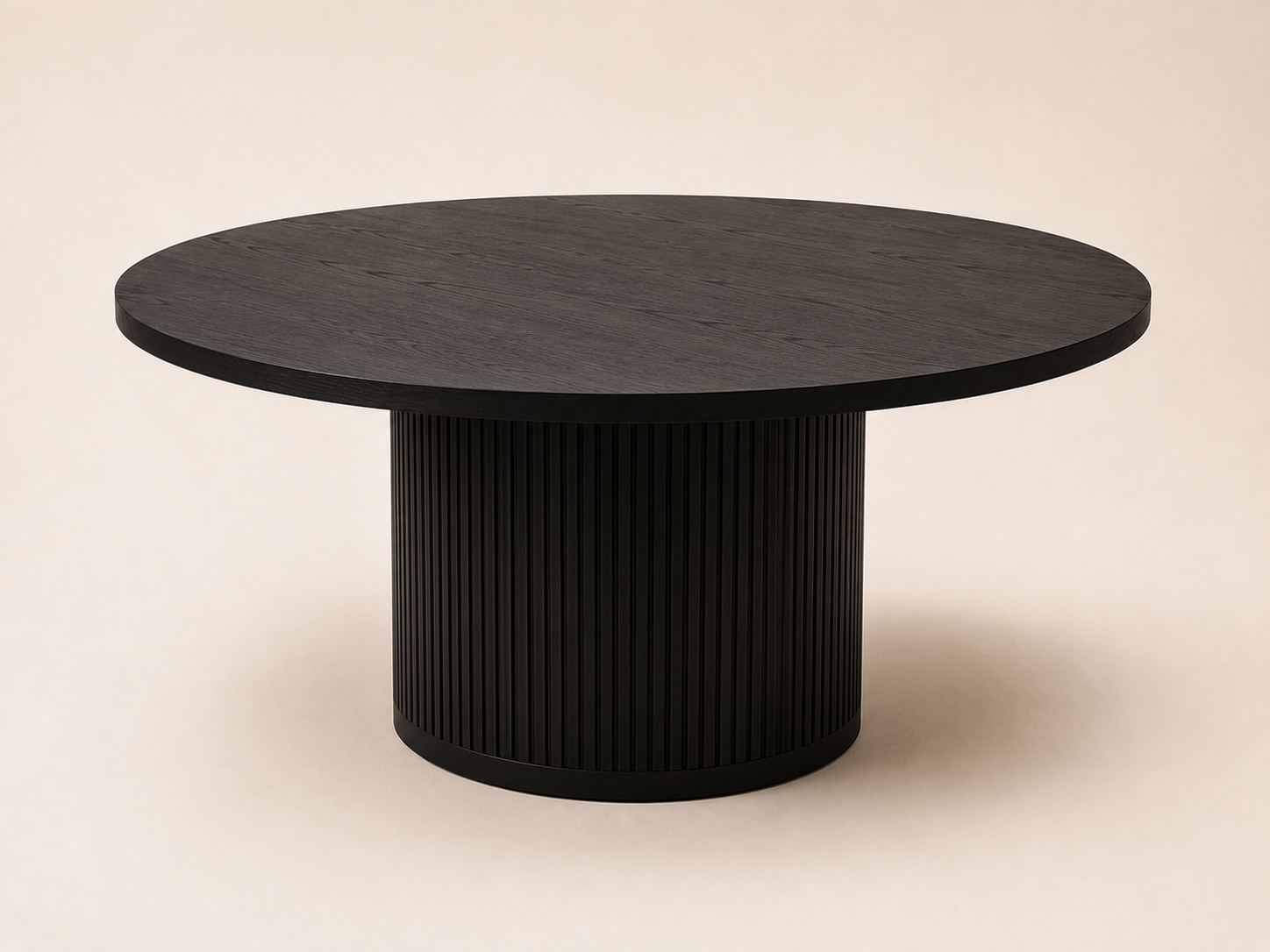 60-inch round black dining table with architectural fluted pedestal base
